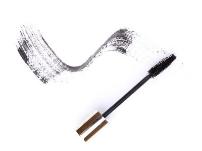 Black mascara brush stroke isolated on white