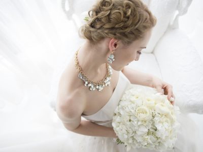 Bride sitting with a bridal bouquet