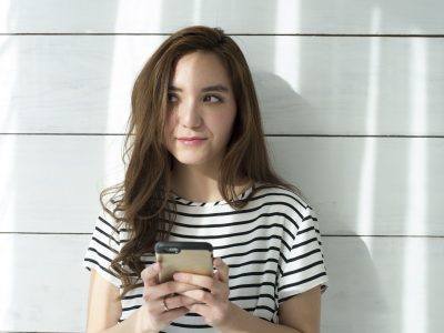 Young woman is waiting for contact from friends