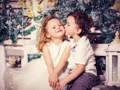Little boy and girl in love in christmas